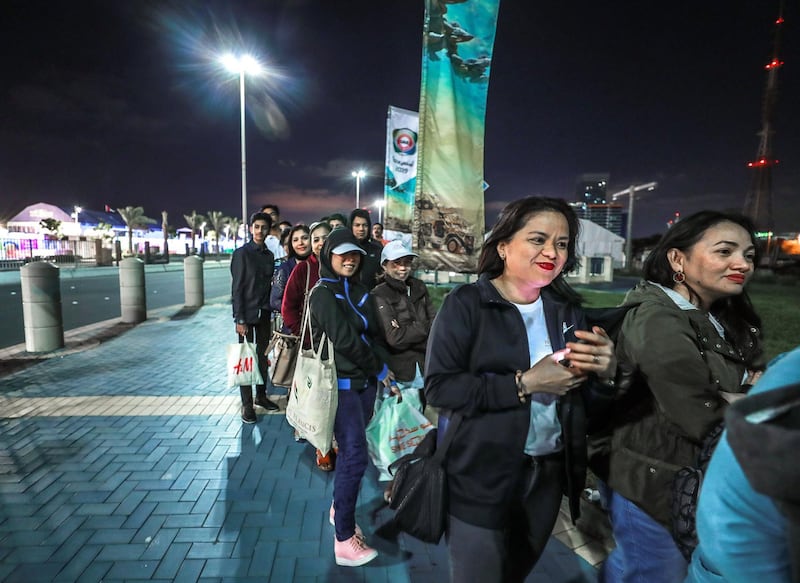 Abu Dhabi, U.A.E., February 5, 2019.   Worshipers heading onto buses at Nation Towers before they're transported to the mass.
Victor Besa/The National
Section:  NA
Reporter: