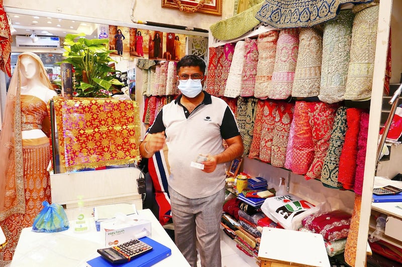 Manoj Kumar at his shop in Meena Bazaar area in Bur Dubai in Dubai on April 5,2021. Pawan Singh / The National. Story by Sarwat