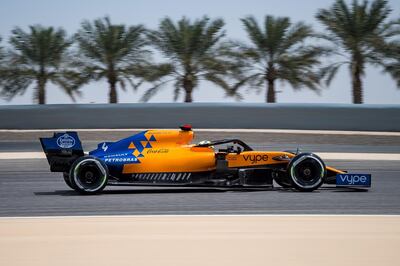 McLaren's British driver Lando Norris steers his car during in-season tests at the Sakhir circuit in the desert south of the Bahraini capital Manama, on April 3, 2019. / AFP / ANDREJ ISAKOVIC
