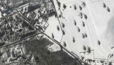 A satellite image shows artillery impact craters next to a residential area in Kharkiv, Ukraine. AFP