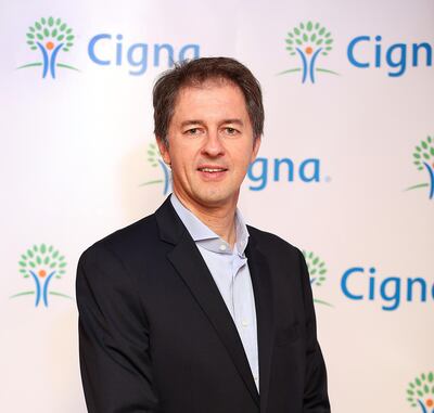 Jerome Droesch, chief executive of Cigna in the Middle East and Africa, says the insurer will treat confirmed Covid-19 cases as emergencies and cover all costs, as stipulated by the UAE government. Courtesy Cigna
