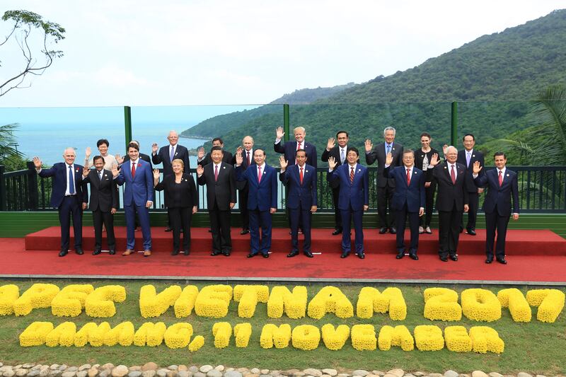 Ms Ardern attends a group photo with other leaders at the 2017 Asia-Pacific Economic Co-operation summit in Vietnam. AFP