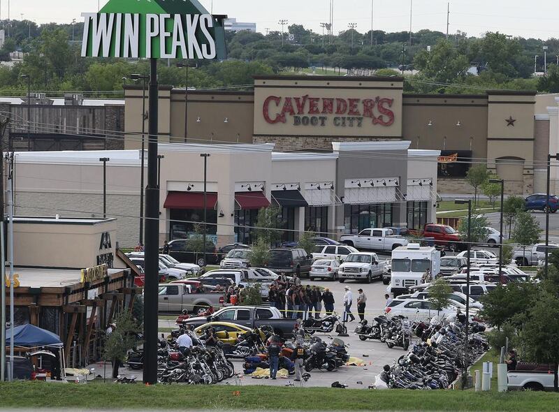 It erupted shortly after noon on Sunday and quickly escalated into a brawl involving clubs, knives and chains. Jerry Larson/AP Photo