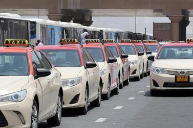 Owners of Dubai taxi number plates will share in a Dh14 million windfall. Pawan Singh / The National