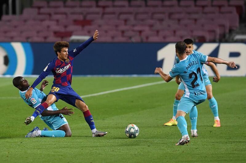 Barcelona's  Riqui Puig competes fore the ball against Leganes. Getty Images