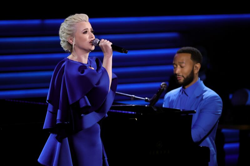 Ukrainian singer Mika Newton and Legend perform during the 64th Grammy Awards at MGM Grand Garden Arena on April 3. AFP
