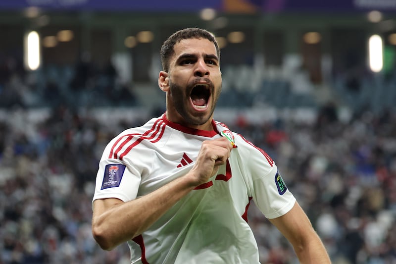 Sultan Adil celebrates after scoring for the UAE in their 1-1 Asian Cup draw against Palestine at the Al Janoub Stadium in Qatar on January 18, 2024. Getty Images