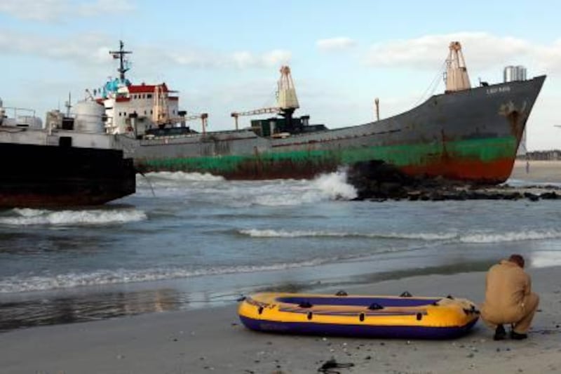 Sharjah, 13th February 2011.  Sea Mermid a barge and Lady Rana a cargo vessel both rans aground due to strong waves, on a beach shore at Sharjah Corniche.  (Jeffrey E Biteng / The National)