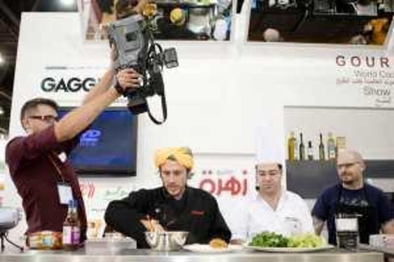 Abu Dhabi - March 18, 2009: Chef Chakall demonstrates recipes form his cookbook at the Abu Dhabi Book Fair. Lauren Lancaster / The National *** Local Caption ***  LL_18.03.09_CookBooks005.jpg