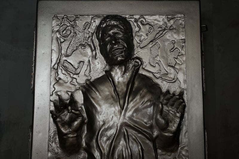 A display depicting the scene in Star Wars in which Han Solo is frozen in carbonite