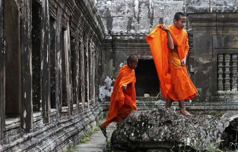 Monks visit the 900-year-old Preah Vihear temple on the border between Thailand and Cambodia. Samrang Pring / Reuters

