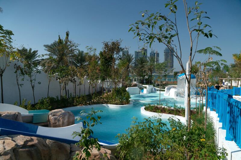 The beachside water park in Dubai is surrounded by plenty of greenery.