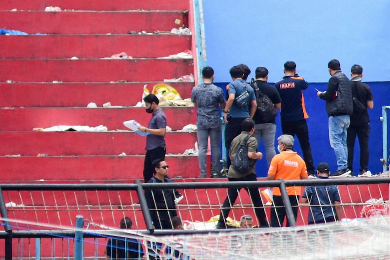 Indonesian police continue investigation at the stadium on October 13. AFP