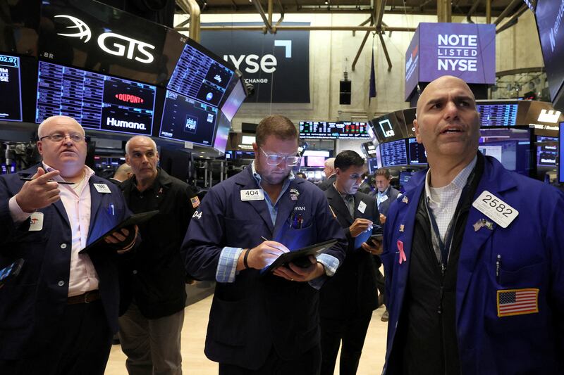 Traders work on the floor of the New York Stock Exchange. Reuters