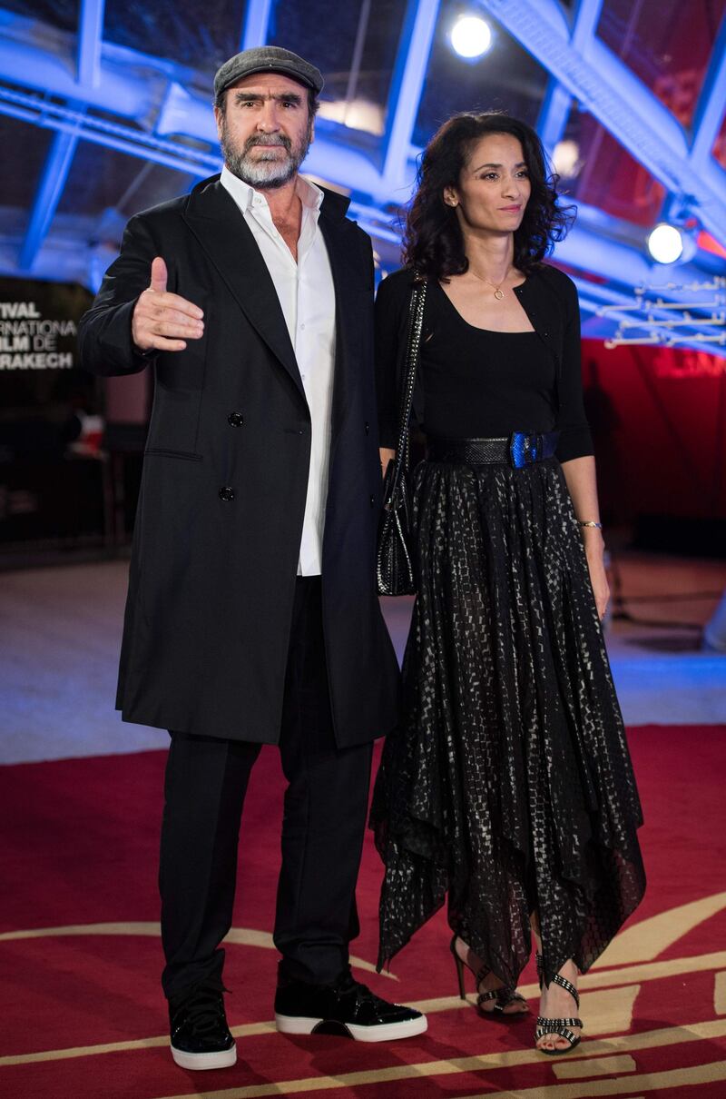 French actor and former footballer Eric Cantona and his wife Rachida Brakni attend the opening ceremony of the 18th edition of the Marrakech International Film Festival on November 29, 2019. AFP