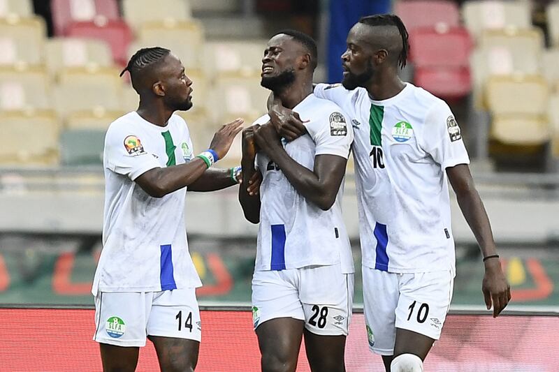 Sierra Leone's Musa Noah Kamara, centre, celebrates after scoring their opening goal. AFP