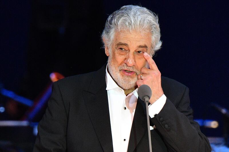 (FILES) In this file photo taken on August 28, 2019 Spanish tenor Placido Domingo gestures as he performs during his concert in the newly inaugurated sports and culture centre 'St Gellert Forum' in Szeged, southern Hungary. Opera star Placido Domingo, who is facing multiple allegations of sexual harassment, on February 25, 2020 apologised for "the hurt" caused to his accusers, saying he accepted "full responsibility" for his actions. / AFP / Attila KISBENEDEK
