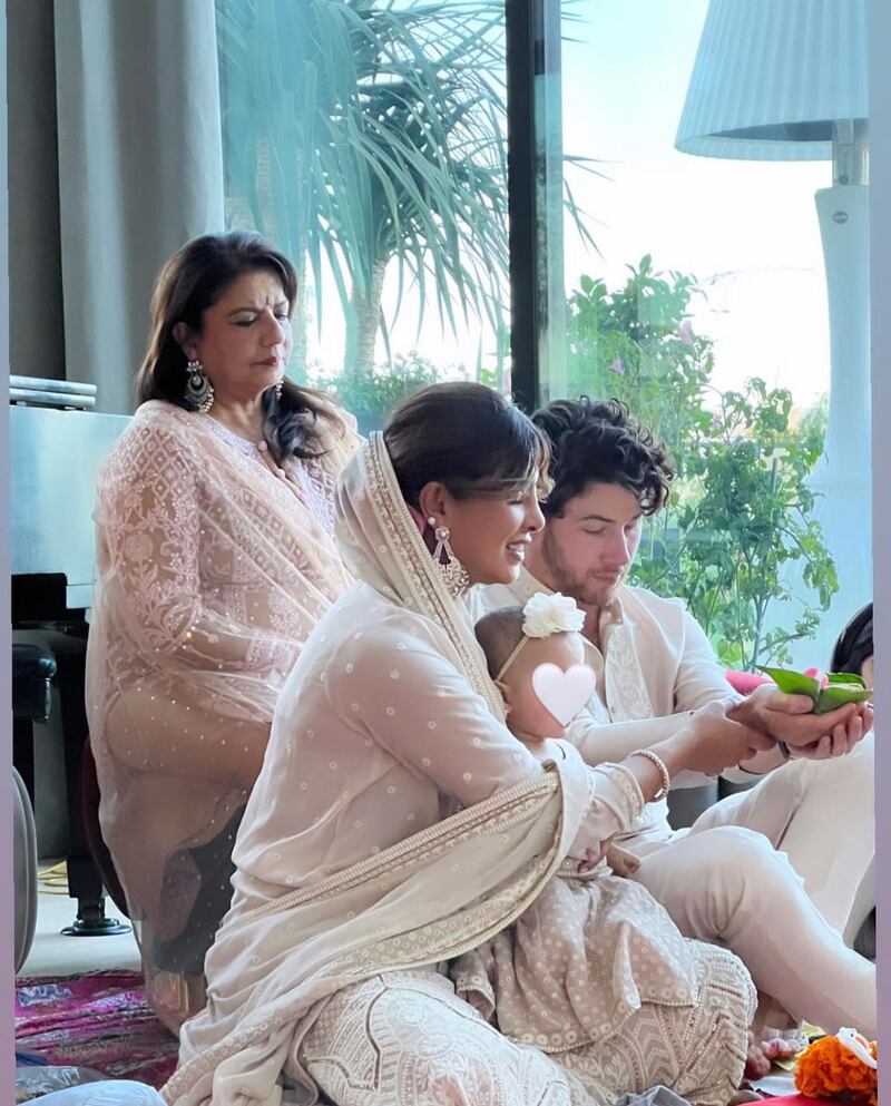 Priyanka Chopra with husband Nick Jonas, daughter Malti Marie and mother Madhu celebrate Diwali at their San Fernando Valley home in Los Angeles. Photo: Instagram / priyankachopra