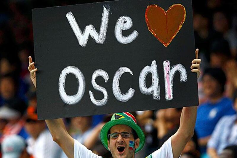 A South African fan celebrates Oscar Pistorius' success in the 400m event at the world championships in Daegu.

David Gray / Reuters