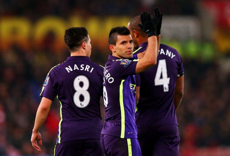 Sergio Aguero of Manchester City celebrates after scoring his team's third goal from the penalty spot in their Premier League win against Stoke on Wednesday. Alex Livesey / Getty Images / February 11, 2015 