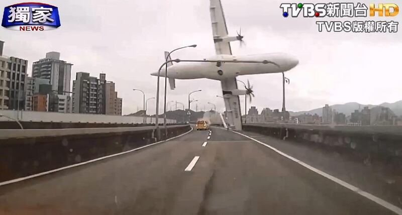 A video grab shows a TransAsia Airways passenger plane on February 4, 2015, before it crashed  into the Keelung River in Taipei, Taiwan. Courtesy TVBS Taiwan / EPA