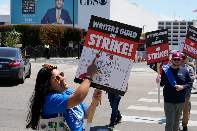 Zoe Marshall, a board member of the Writers Guild of America, left, outside CBS Television City. AP Photo 