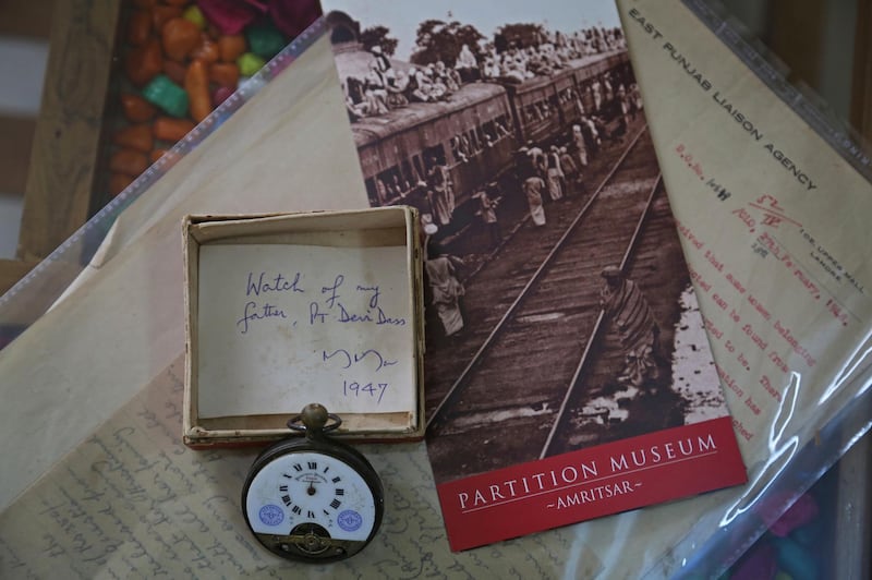 This July, 21, 2017 photograph, shows a pocket watch of Indian man Pandit Devi Dass, who was killed in mob violence in Pakistan which was later donated by his son to the Partition Museum, in New Delhi, India. A new museum on the Partition of the Indian subcontinent opens this week, in the north Indian border city of Amritsar, as the two South Asian giants celebrate seven decades as independent nations. (AP Photo/Altaf Qadri)