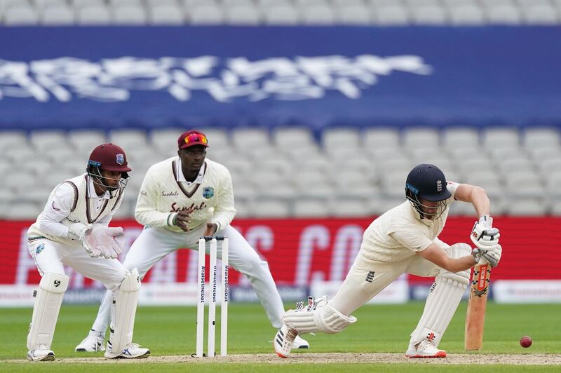 England's Dom Sibley on the defensive. AFP