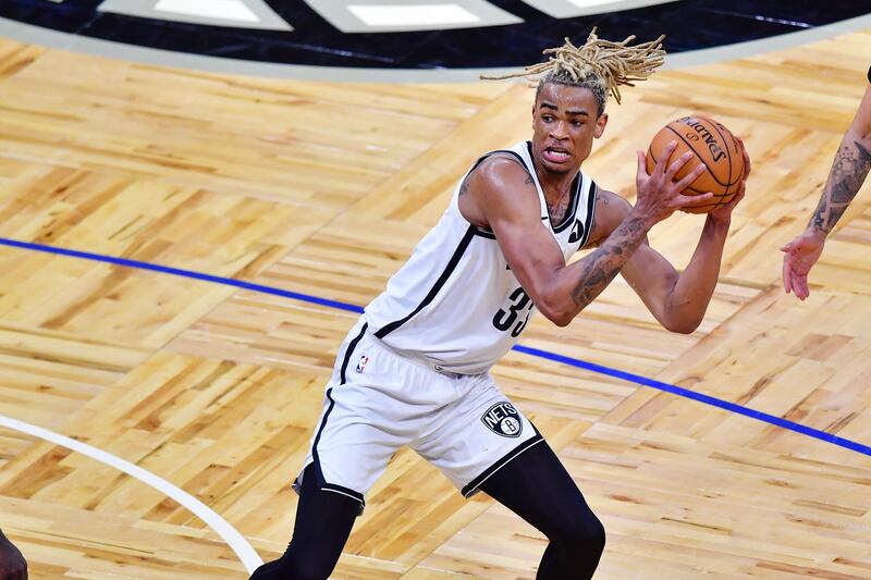 Nicolas Claxton of the Brooklyn Nets grabs an offensive rebound in the second half against the Orlando Magic at the Amway Centre. AFP