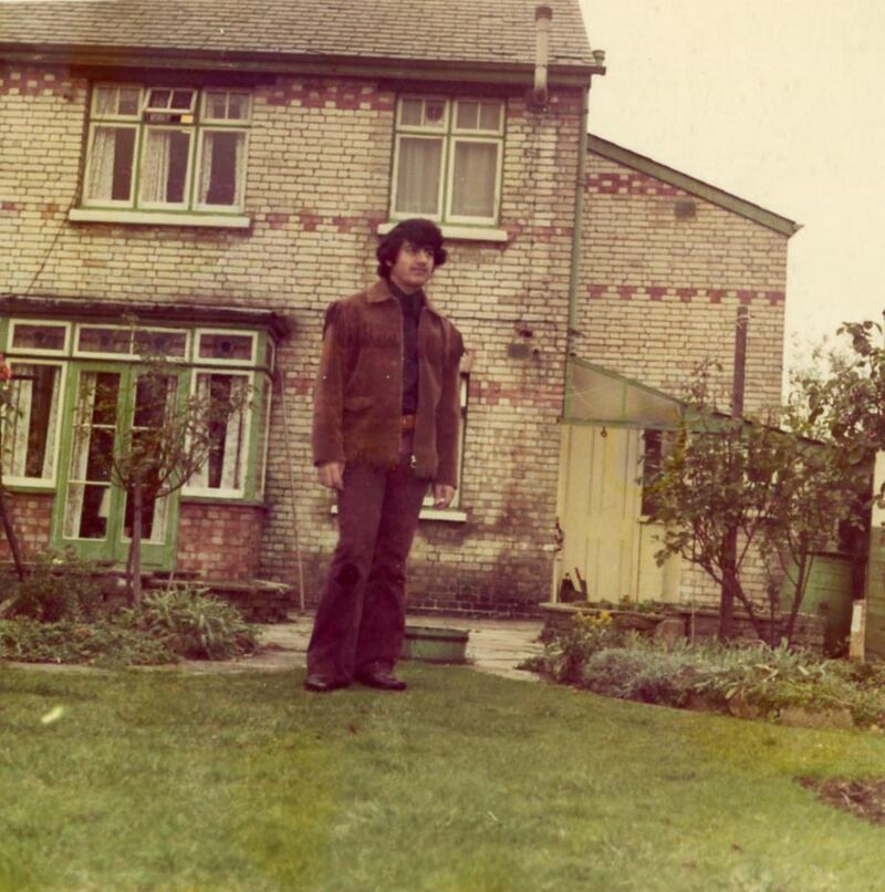 Abbas Al Khoori stood in the garden of the home of Mr and Mrs Taylor in Moredon, London.