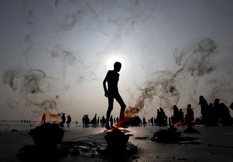 Hindu pilgrims on Sagar Island during a religious festival in Kolkata, India. EPA

