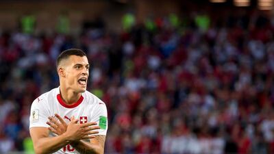 Switzerland midfielder Granit Xhaka celebrates scoring against Serbia at the 2018 World Cup with the 'double eagle' a reference to the flag of Albania. EPA