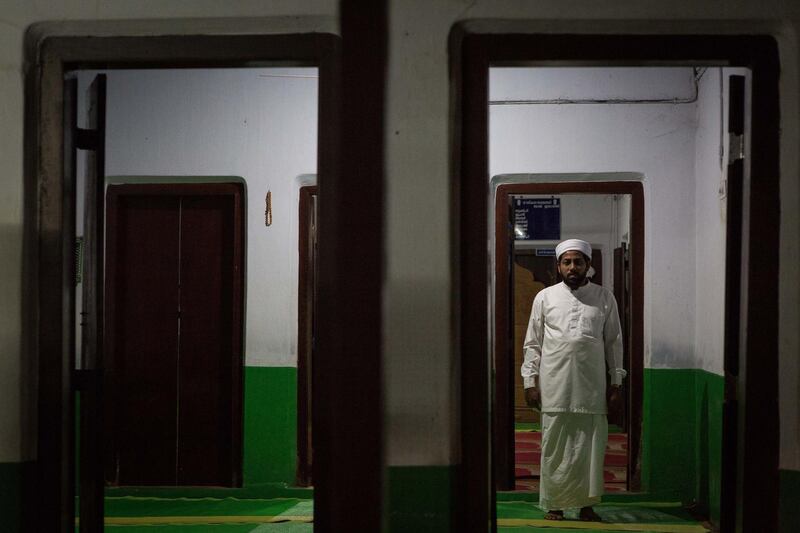 Portrait of Ibrahim Baqavi Omasserry, imam at Payurthottam Juma Masjid in Malappuram, Kerala, India. Photo by Sebastian Castelier 