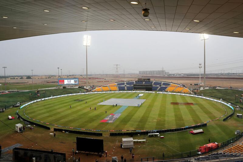 ABU DHABI , UNITED ARAB EMIRATES , Nov 20 – 2019 :- Ground staff covering the pitch after the rain during the Abu Dhabi T10 Cricket match between Maratha Arabians vs Karnataka Tuskers at Sheikh Zayed Cricket Stadium in Abu Dhabi. ( Pawan Singh / The National )  For Sports. Story by Paul