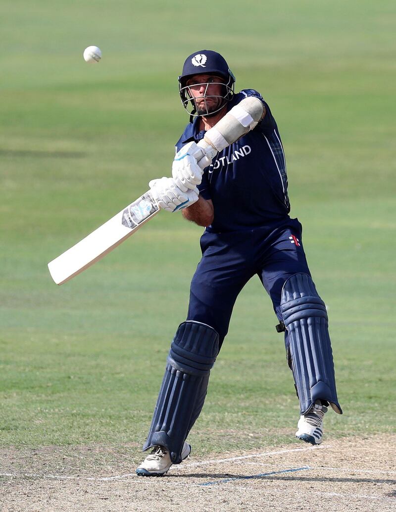 Dubai, United Arab Emirates - October 30, 2019: Kyle Coetzer of Scotland scores more runs during the game between the UAE and Scotland in the World Cup Qualifier in the Dubai International Cricket Stadium. Wednesday the 30th of October 2019. Sports City, Dubai. Chris Whiteoak / The National