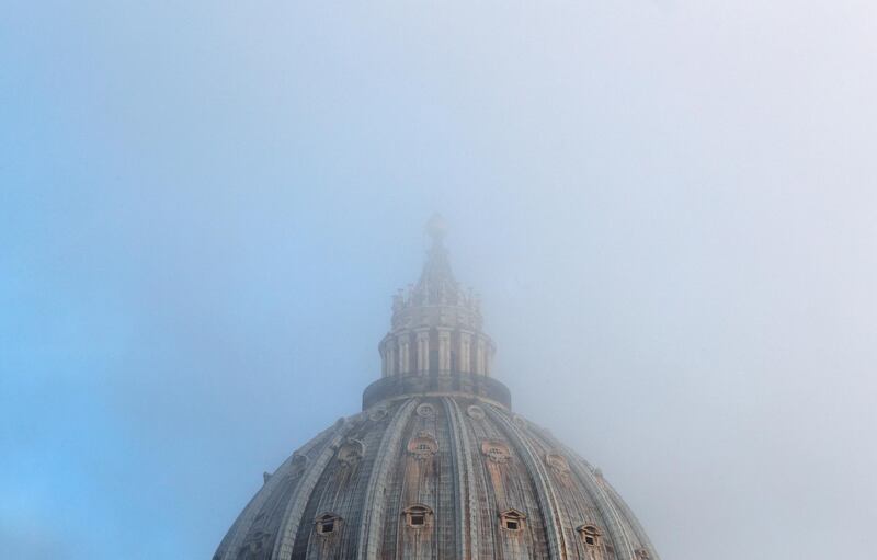 The dome of Saint Peter's Basilica is seen covered in fog, before Pope Francis' weekly general audience in Saint Peter's Square at the Vatican. Reuters