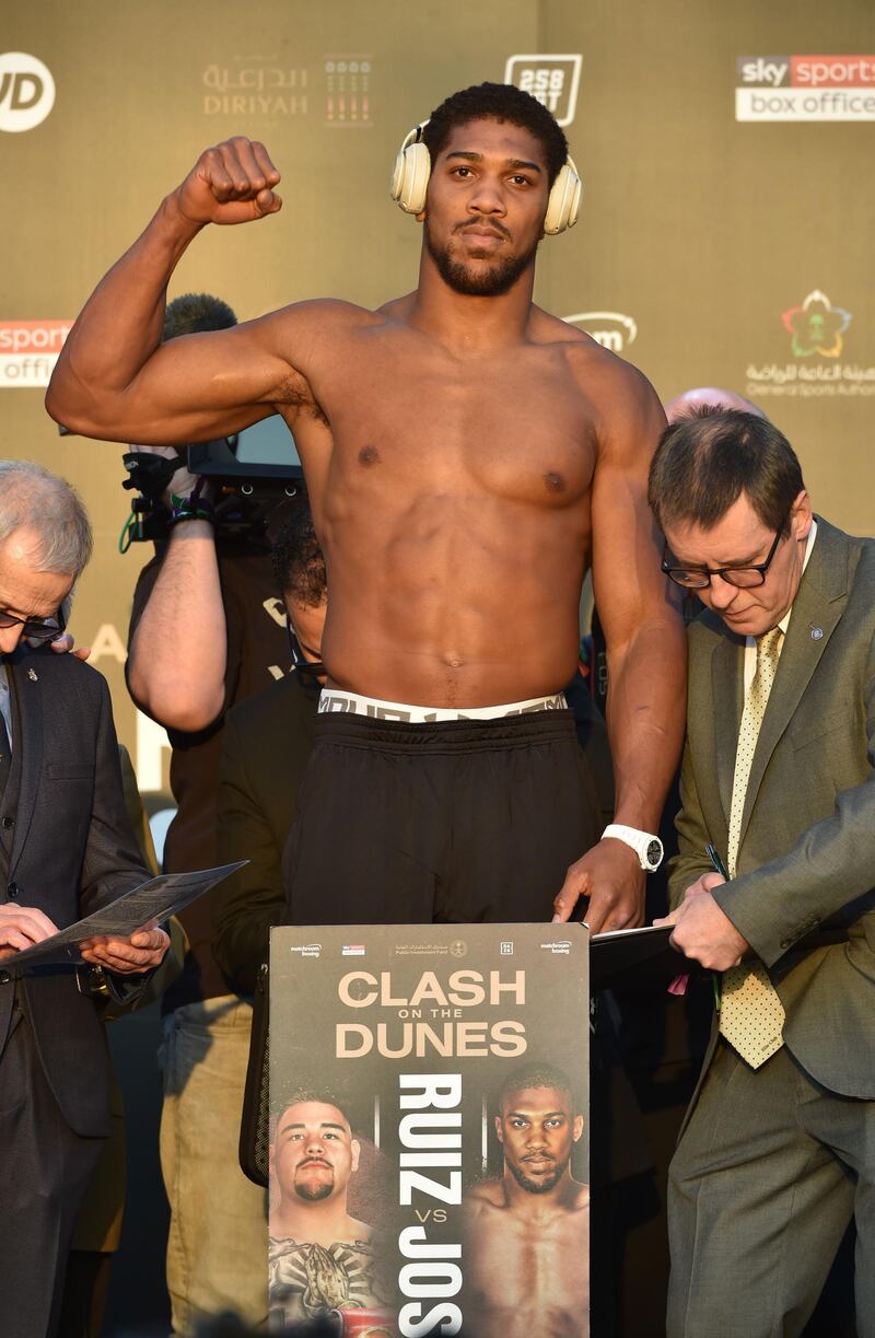 Anthony Joshua on the scales. AFP