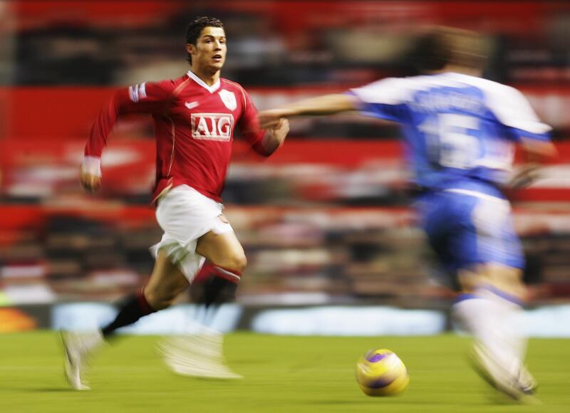 MANCHESTER, UNITED KINGDOM - DECEMBER 26: Cristiano Ronaldo of Manchester United attacks the Wigan goal during the Barclays Premiership match between Manchester United and Wigan Athletic at Old Trafford on December 26, 2006 in Manchester, England. (Photo by Laurence Griffiths/Getty Images)