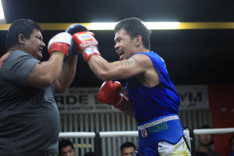 Eight-division boxing champion and Philippine Senator Manny Pacquiao trains for his upcoming fight against Adrien Broner at the Elorde Boxing Gym in Pasay City, Metro Manila.