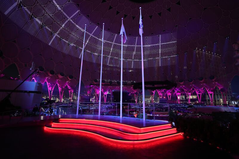 The technical crew work with the spotlights during night rehearsals at Al Wasl dome. Pawan Singh / The National  