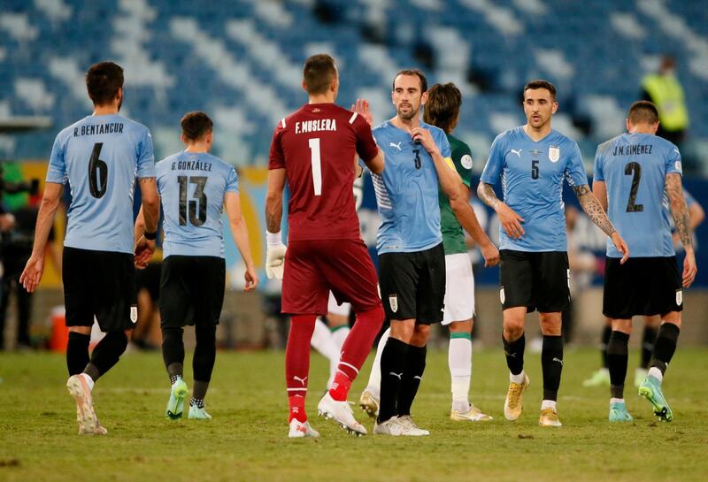 Uruguay's Diego Godin Fernando Muslera celebrate after the match. Reuters