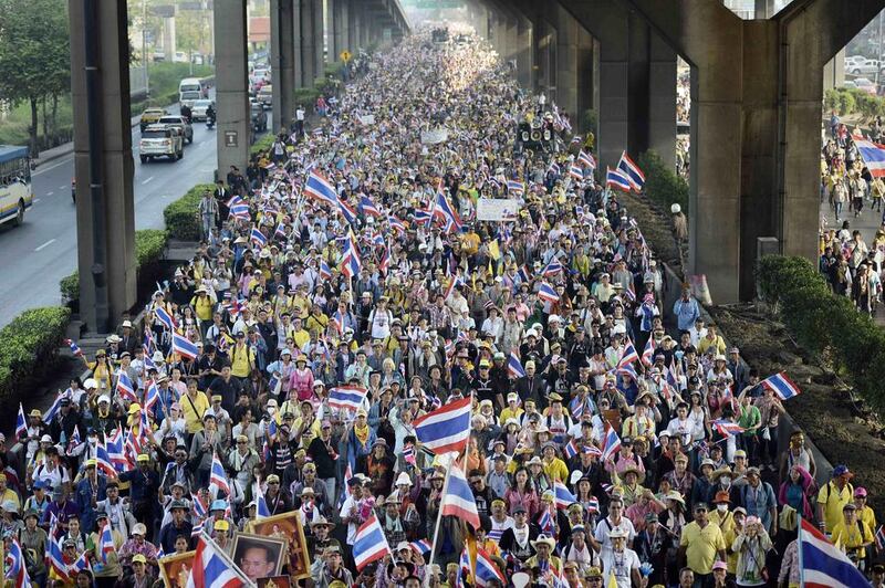 Anti-government protesters march during a rally in Bangkok. Dylan Martinez / Reuters