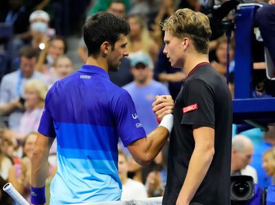 Novak Djokovic with Jenson Brooksby after the match. USA TODAY Sports