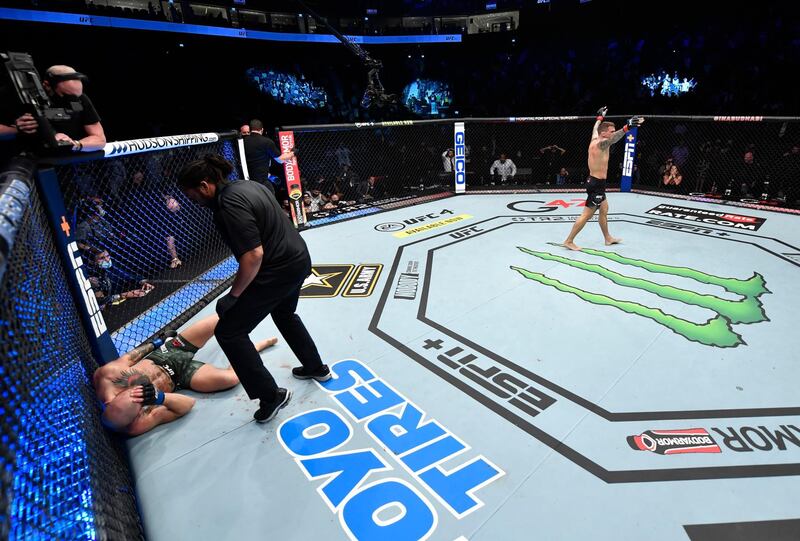 ABU DHABI, UNITED ARAB EMIRATES - JANUARY 23: Dustin Poirier reacts after his knockout victory over Conor McGregor of Ireland in a lightweight fight during the UFC 257 event inside Etihad Arena on UFC Fight Island on January 23, 2021 in Abu Dhabi, United Arab Emirates. (Photo by Jeff Bottari/Zuffa LLC)