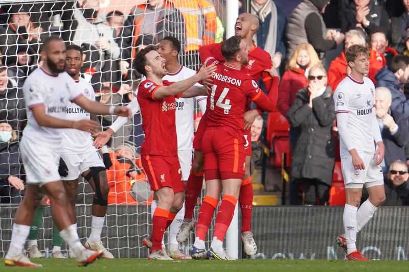 Fabinho celebrates after scoring Liverpool's opening goal. AP