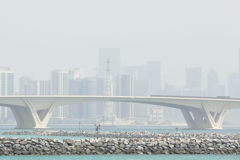 Hazy and dusty conditions on Al Reem Island in Abu Dhabi. Khushnum Bhandari / The National