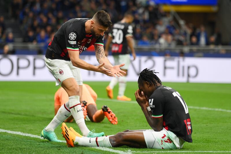 AC Milan's Olivier Giroud consoles teammate Rafael Leao after he missed a chance. Getty Images