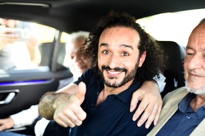 Prominent Egyptian activist Ahmed Douma gestures after being released from prison following a presidential pardon on Saturday. EPA