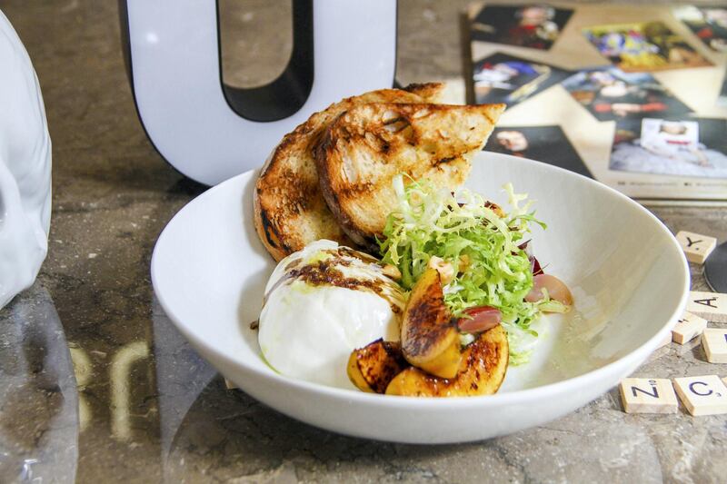 <p>Burrata with&nbsp;shaved fennel, hazelnuts and grilled peaches at Qwerty: the dish is part of the eatery&#39;s new menu created by&nbsp;Aussie chef de cuisine&nbsp;Candice Walker</p>
