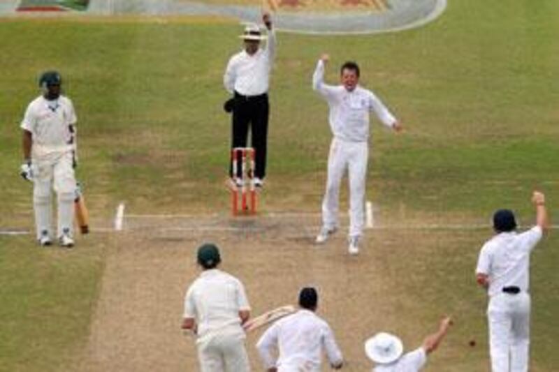 England celebrate the wicket of Dale Steyn yesterday.